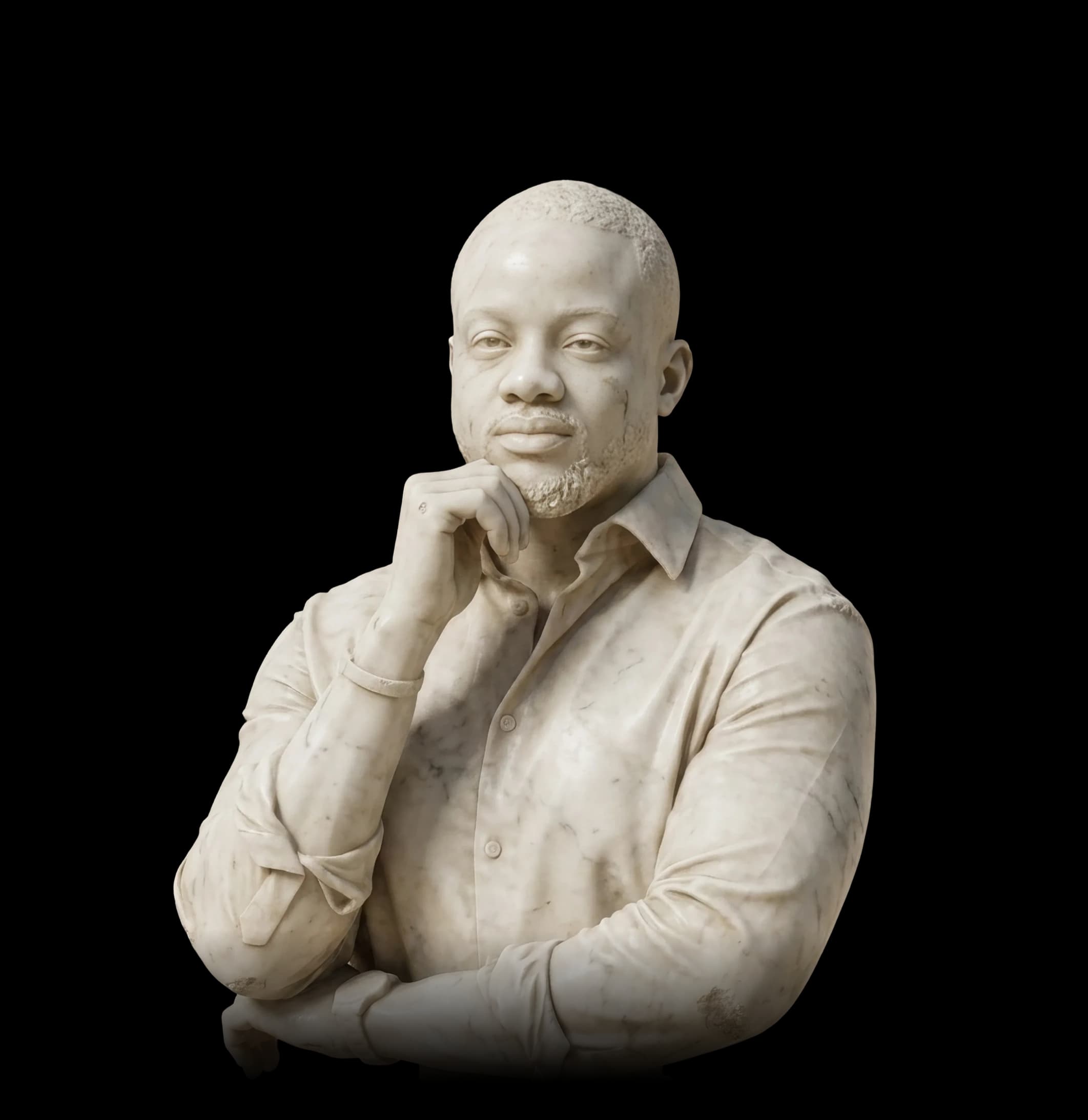 A marble bust of Dr. Wahab Disu, arms folded and a hand resting at the chin