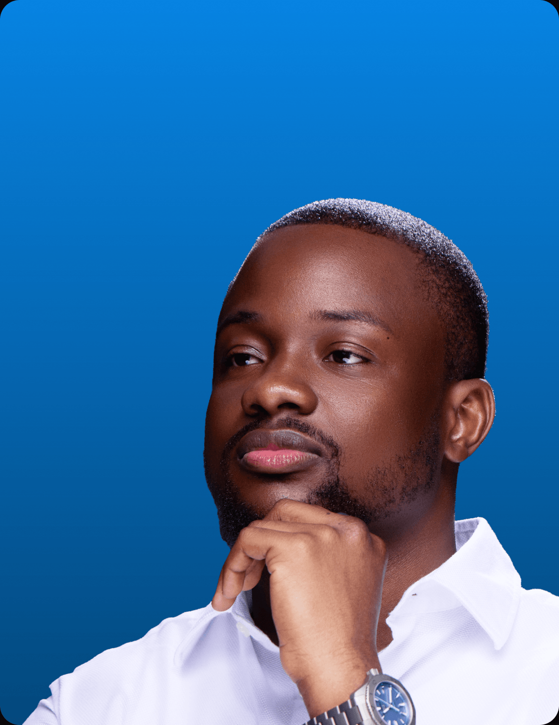 Portrait of Dr. Wahab Disu in a white shirt against a dark blue background