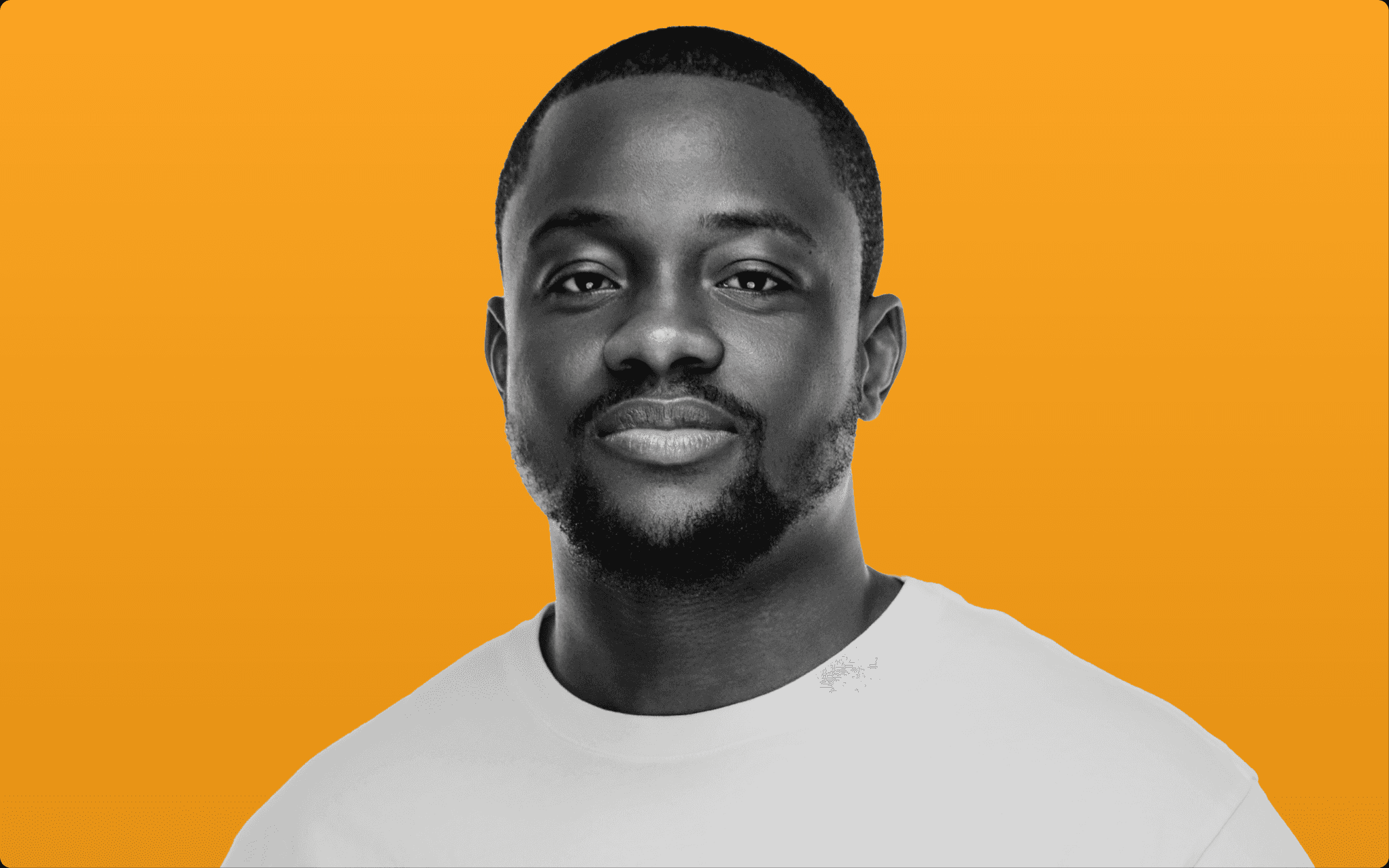 Portrait of Dr. Wahab Disu against a honey-wax orange background